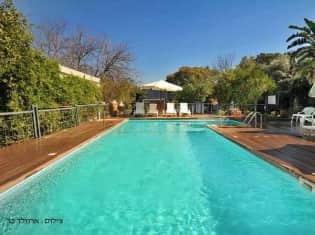 לדף הבית של איתן בקתות עץ Eitan wood cabins resort